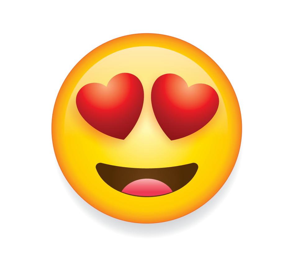 Illustration of a smiling emoticon with hearts for eyes.