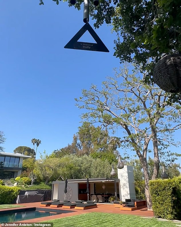 Her mid-century home features four bedrooms, six-and-a-half bathrooms with a wine cellar, pool, and guesthouse; it also has city and ocean views sitting on almost two acres of land