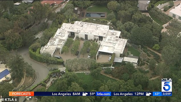 The possible intruder was apprehended by Aniston's security team and held at gunpoint as they awaited for the Los Angeles Police Department to arrive