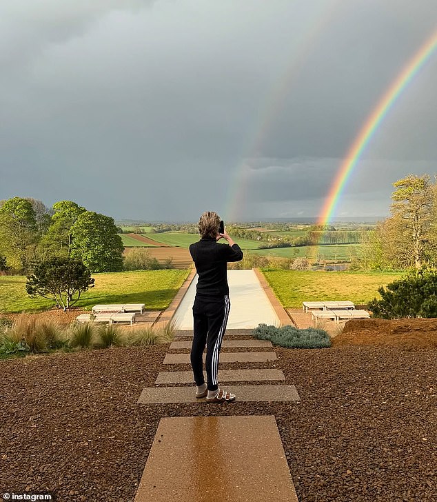 Last month in April, she snapped a photo while standing behind Portia as they looked out at the scenic view of the countryside and a double rainbow following a rainfall