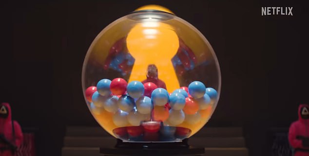 The footage also shows the players using a massive gumball machine, with each player receiving either a red or a blue gumball