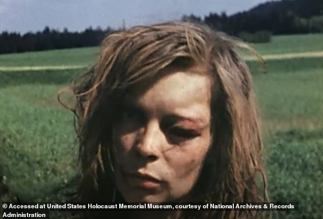 Just over 17 minutes into the clip, Hoglund's camera settles on the woman who the world now knows only as 'Lost German Girl'