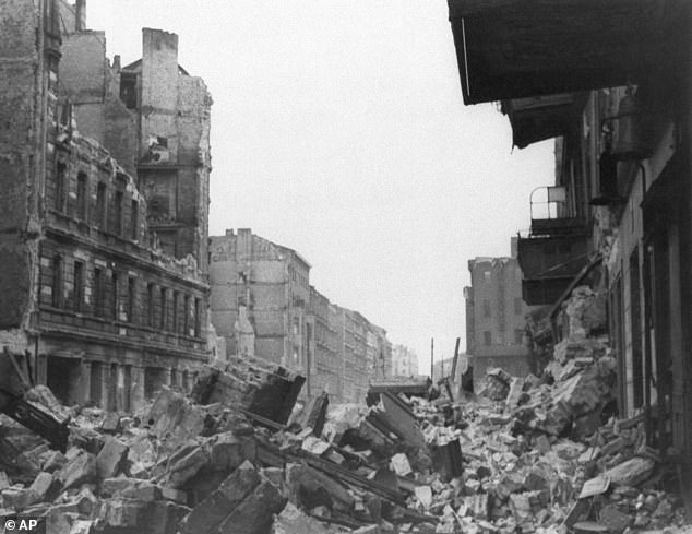Wreckage and debris fill Frankfurter Allee near Lasdehner Strasse in a working district in the eastern section of Berlin