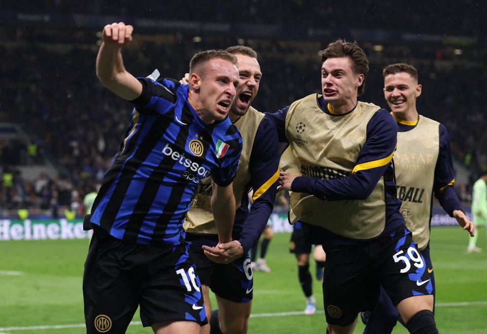 Davide Frattesi of FC Internazionale celebrates scoring a goal with teammates.