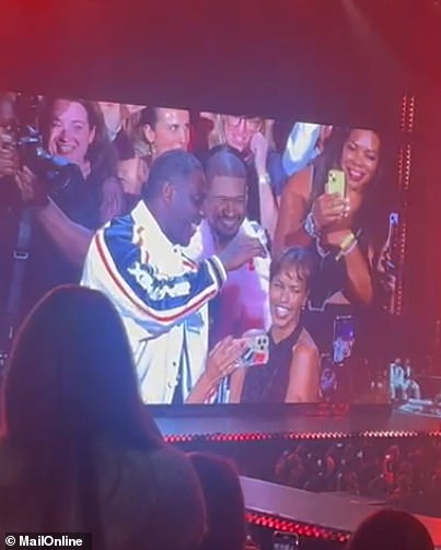 Video shows the moment the rapper, 46, approached the Luther actor, 52, and the glamorous model, 35, as they enjoyed a date night at a VIP table at his show