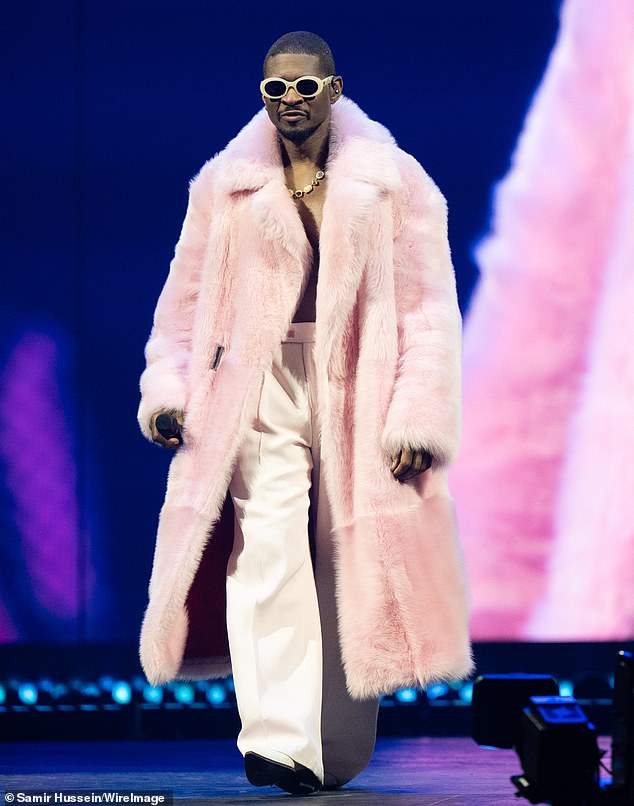 He went shirtless under a dramatic pink fur coat