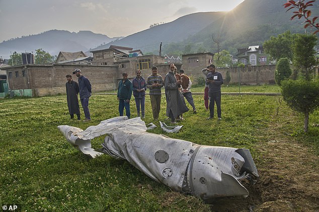 Debris of an aircraft lies in the compound of a mosque at Pampore in Pulwama district of Indian controlled Kashmir, Wednesday, May 7, 2025