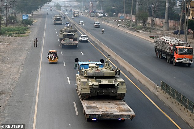 Tanks are transported on a road in Muridke near Lahore, Pakistan, May 7, 2025