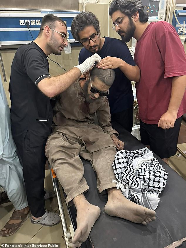 This handout photograph released by the Pakistan's Inter Services Public Relations (ISPR) on May 7, 2025 shows paramedics giving treatment to an injured man at a hospital in Bahawalpur, Punjab province, following strikes in Pakistan
