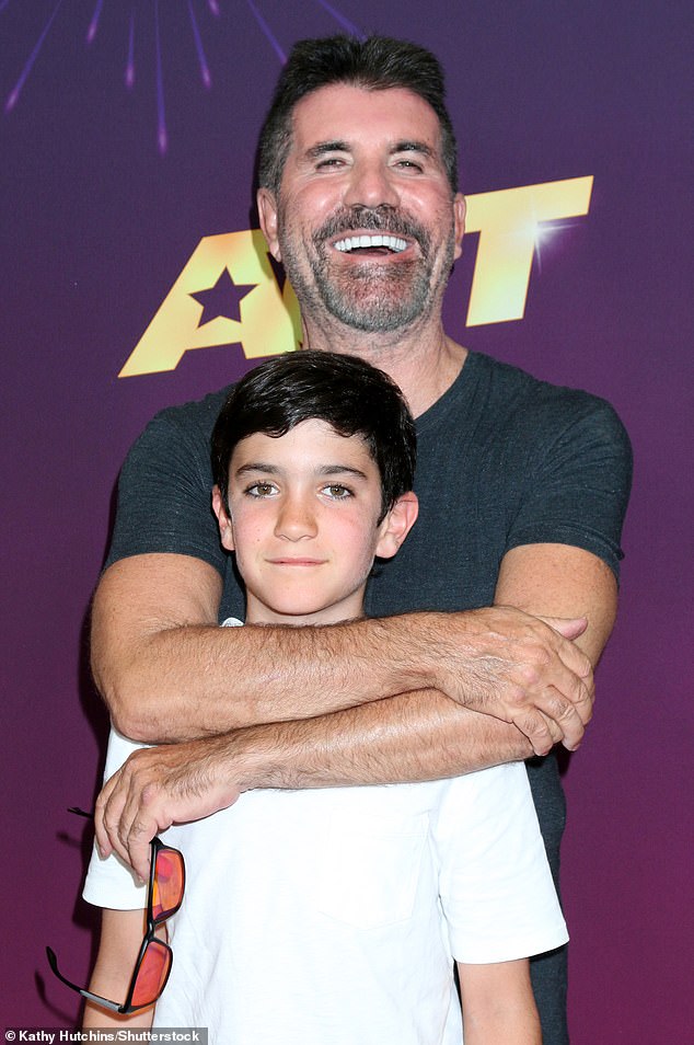Simon's slow wind down has come in recent years as he bids to focus more on his partner Lauren Silverman, with whom he shares son Eric, 11 (pictured 2024)