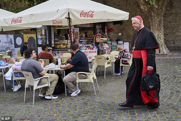 Cardinal Gerhard Ludwig Müller walks outside the Vatican, Tuesday, May 6, 2025