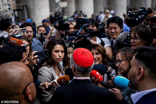 Cardinal Jean-Paul Vesco speaks to the press, ahead of the conclave to elect the next pope, as seen from Rome, Italy, May 6, 2025