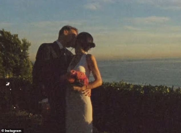 The newly-weds took to their Instagram to share a grainy video of the them tying the knot in a romantic ceremony, captioning their posts: 'Mr & Mrs Gruffudd. Marriage now, wedding later'