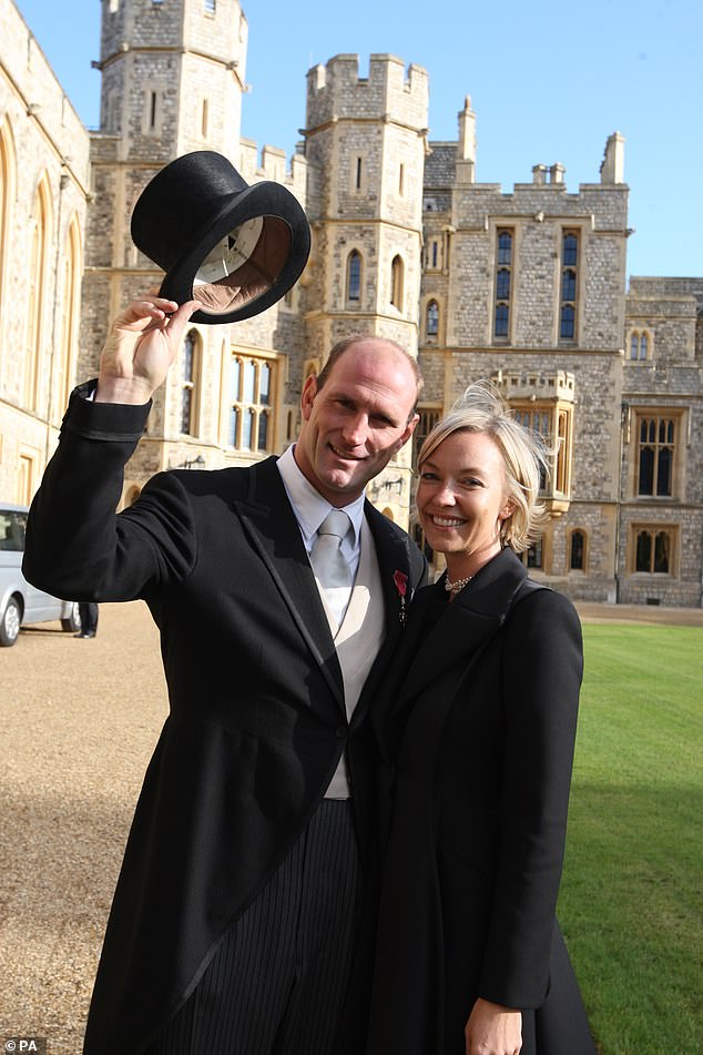 Dallaglio with Alice as he receives as he receives his OBE at Windsor Castle