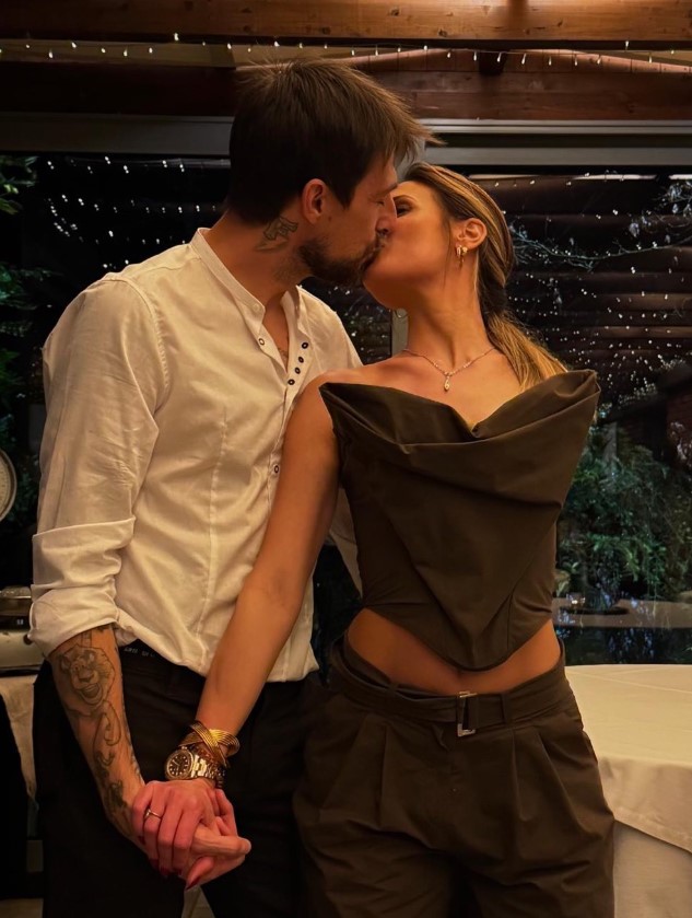 Couple kissing.