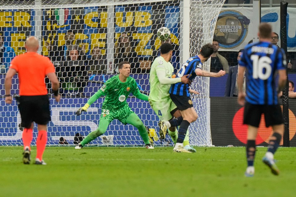 Francesco Acerbi scoring a goal during a soccer match.