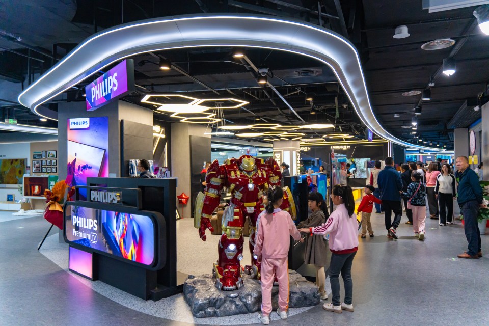 Shoppers at the grand opening of a large JD.com mall in Chongqing, China.