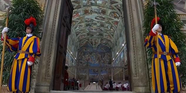 The voting cardinals - those aged under 80 who are the only ones eligible to cast a ballot - were urged to 'invoke the help of the Holy Spirit' to help them elect a pope