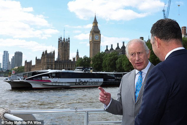His Majesty looked delighted as he had the famous skyline including the Houses of Parliament behind him