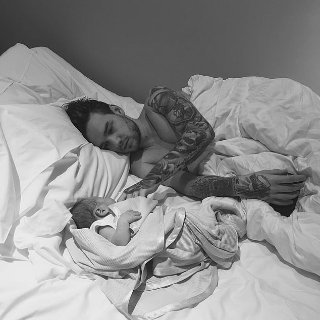Following his death, Cheryl shared this heartbreaking picture of Liam in bed with his son Bear