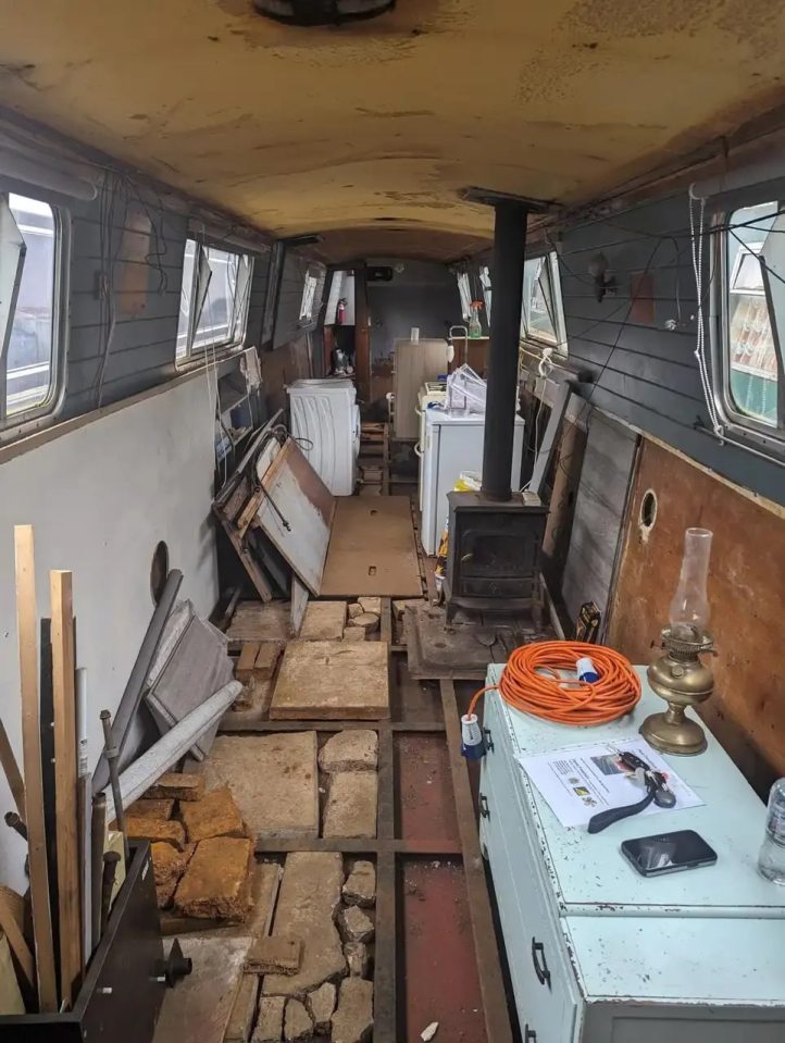 Interior of a narrowboat under renovation.