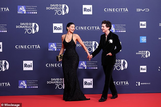 The couple put on a loved-up display as they walked hand-in-hand into the awards together