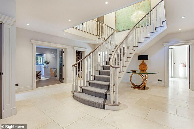 The £3.2million detached property in Buckinghamshire sits on six acres of land and has a swimming pool, a stable and an annex