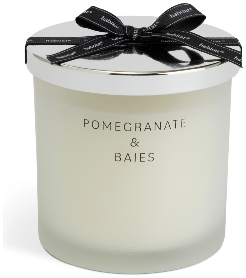Pomegranate & Baies candle with silver lid and black ribbon.