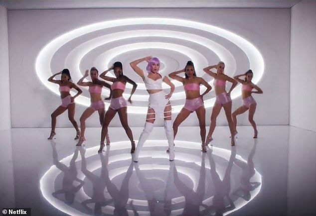 The very next day, Miley had to film her pop star character Ashley O's dance-filled On a Roll music video, shrugging: 'The show must go on!'