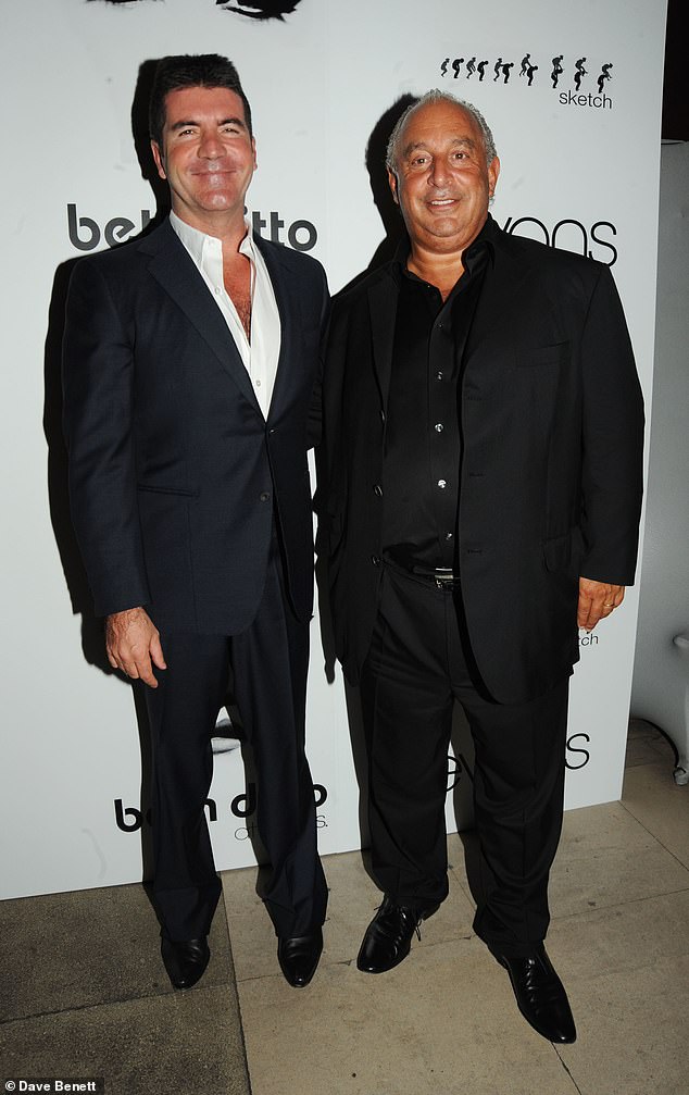 While Simon did not specifically name any of the billionaires he was referring to, he has previously pictured with Top Shop owner Sir Phillip Green (pictured in 2009)
