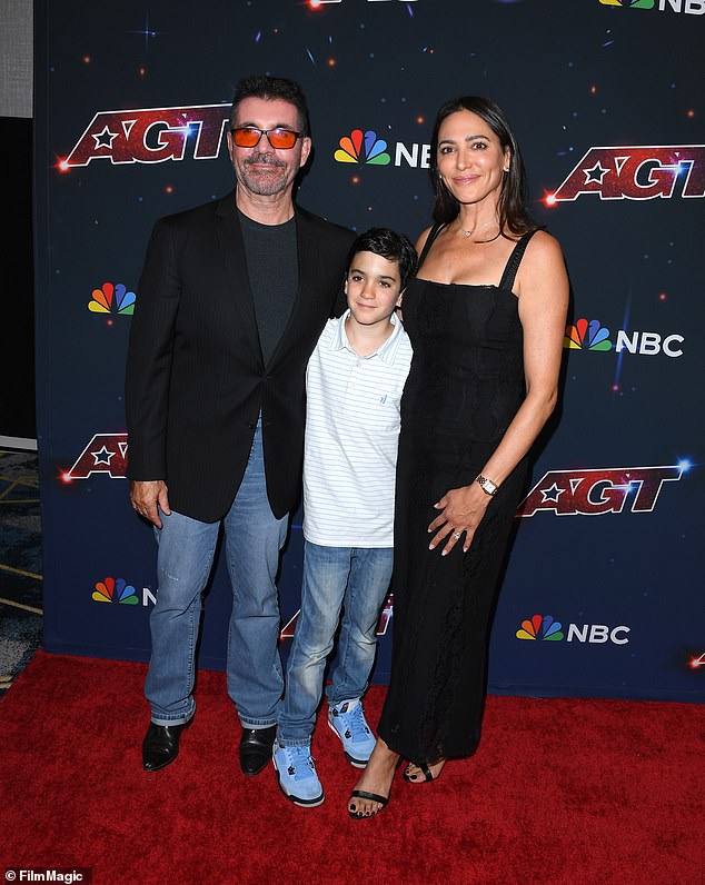 Simon also shared that he doesn't feel money is the biggest drive for him, and he's happy with the amount he has, with his fiancée Lauren Silverman and their son Eric at his side