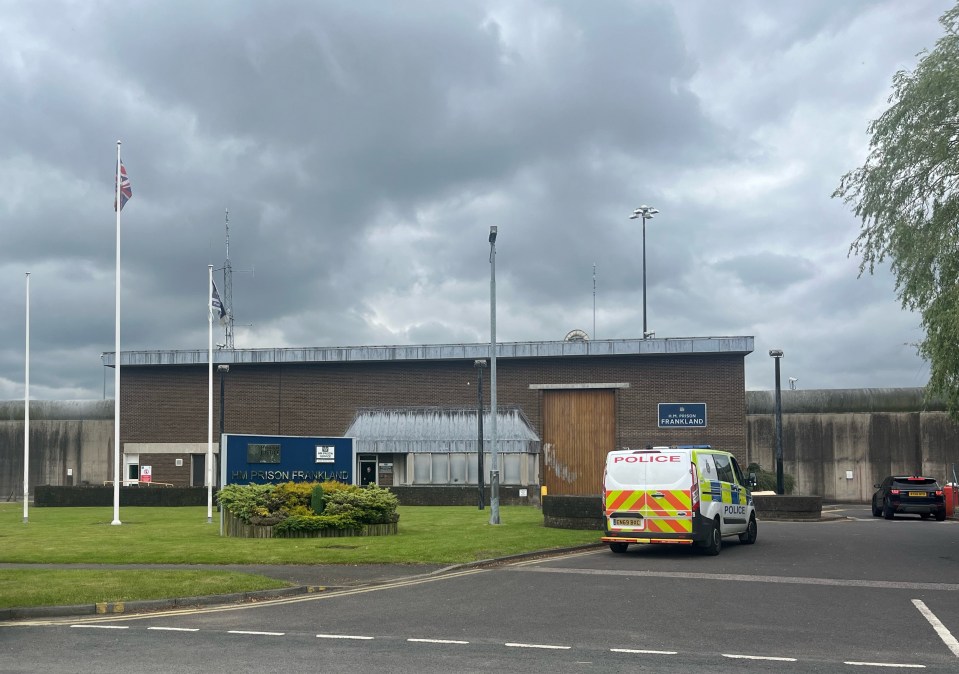 Photo of HMP Frankland prison in Durham, with a police van outside.