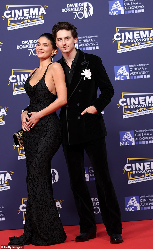 Meanwhile Timothee's 'rather studied body language and styling' made it seem 'as though he's playing a new role for the cameras'