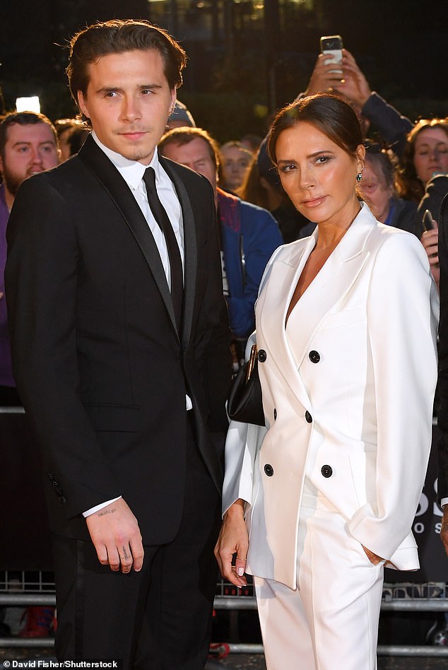 Now David is reportedly worried 'history is repeating itself' amid his rift with his and Victoria's eldest son Brooklyn (pictured together in 2019)
