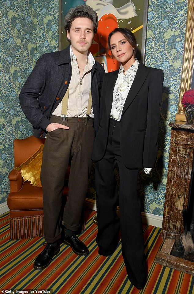 The fashion designer, 51, and David are said to have been left heartbroken at the distance that has grown between them and their eldest son (Victoria and Brooklyn are pictured in 2019)
