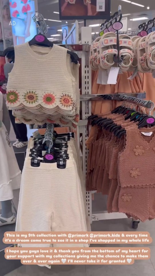 Children's clothing on display in a store.