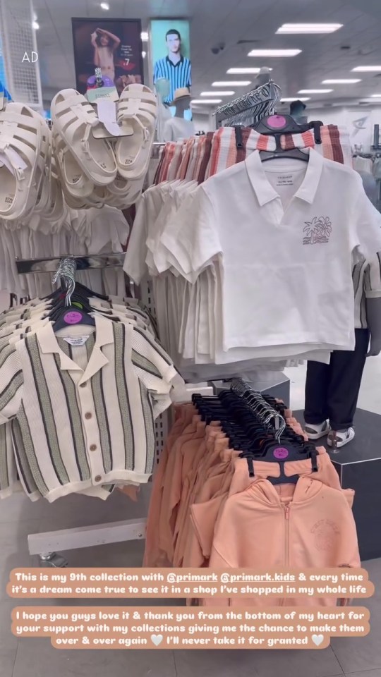 Clothing and sandals on display in a Primark store.