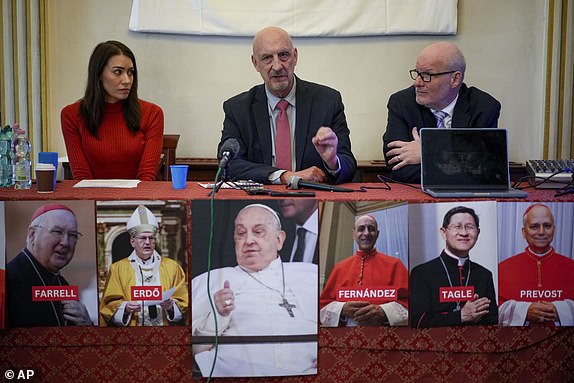 From left, SNAP, Survivors Network of those Abused by Priests, activists Sarah Pearson, Peter Isely and president Shaun Dougherty talk to reporters during a press conference, in Rome, Tuesday, March 25, 2025. (AP Photo/Andrew Medichini)