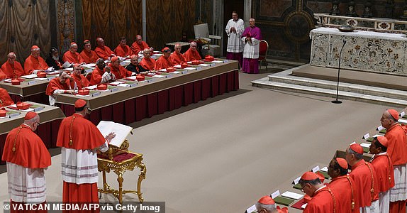 This photo taken and handout on May 7, 2025 by The Vatican Media shows cardinals before the start of the conclave to elect a new Pope in the Sistine chapel in The Vatican. (Photo by Handout / VATICAN MEDIA / AFP) / RESTRICTED TO EDITORIAL USE - MANDATORY CREDIT "AFP PHOTO / VATICAN MEDIA" - NO MARKETING - NO ADVERTISING CAMPAIGNS - DISTRIBUTED AS A SERVICE TO CLIENTS (Photo by HANDOUT/VATICAN MEDIA/AFP via Getty Images)