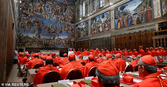 Cardinals pray in the Sistine Chapel, ahead of the conclave to elect the next pope at the Vatican, May 7, 2025. Vatican Media/Handout via REUTERS    THIS IMAGE HAS BEEN SUPPLIED BY A THIRD PARTY