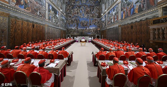 epa12081494 Cardinals gather before the start of the conclave to elect a new Pope in the Sistine chapel at the Vatican City, 07 May 2025.  EPA/VATICAN MEDIA HANDOUT  HANDOUT EDITORIAL USE ONLY/NO SALESHANDOUT EDITORIAL USE ONLY/NO SALES