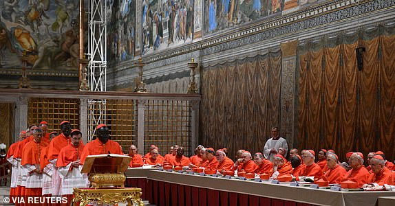 Cardinals pray in the Sistine Chapel, ahead of the conclave to elect the next pope at the Vatican, May 7, 2025. Vatican Media/Handout via REUTERS    THIS IMAGE HAS BEEN SUPPLIED BY A THIRD PARTY