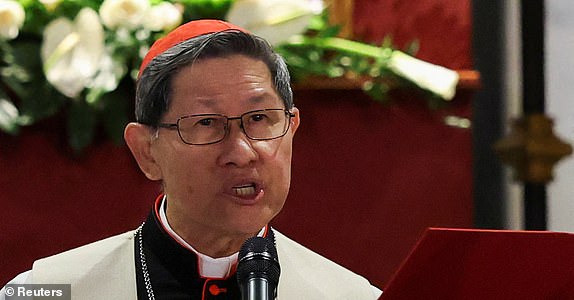 FILE PHOTO: Cardinal Luis Antonio Tagle leads the Rosary for Pope Francis outside the Papal Basilica of Saint Mary Major (Santa Maria Maggiore), following the death of the pontiff, in Rome, Italy, April 24, 2025. REUTERS/Hannah McKay/File Photo