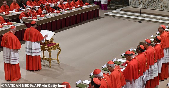 This photo taken and handout on May 7, 2025 by The Vatican Media shows cardinals before the start of the conclave to elect a new Pope in the Sistine chapel in The Vatican. (Photo by Handout / VATICAN MEDIA / AFP) / RESTRICTED TO EDITORIAL USE - MANDATORY CREDIT "AFP PHOTO / VATICAN MEDIA" - NO MARKETING - NO ADVERTISING CAMPAIGNS - DISTRIBUTED AS A SERVICE TO CLIENTS (Photo by HANDOUT/VATICAN MEDIA/AFP via Getty Images)