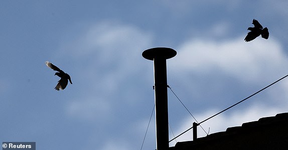 A view of the chimney on the Sistine Chapel roof, as cardinals take part in the conclave to elect the new pope, at the Vatican, May 7, 2025. REUTERS/Yara Nardi