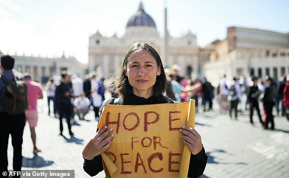 Ukraine's Yona Tukuser poses for pictures at St Peter's Square, as a conclave to elect the next pope takes place at the Vatican, on May 7, 2025. (Photo by Dimitar DILKOFF / AFP) (Photo by DIMITAR DILKOFF/AFP via Getty Images)