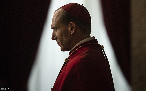 This image released by Focus Features shows Ralph Fiennes in a scene from "Conclave." (Philippe Antonello/Focus Features via AP)