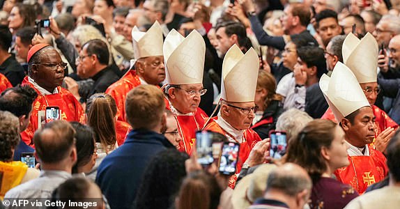 Cardinals attend a mass for the Election of the Roman Pontiff, prior to the start of the conclave, at St Peter's Basilica in The Vatican, on May 7, 2025. (Photo by Dimitar DILKOFF / AFP) (Photo by DIMITAR DILKOFF/AFP via Getty Images)