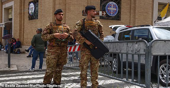 Mandatory Credit: Photo by Beata Zawrzel/NurPhoto/Shutterstock (15287958av) Soldiers equipped with anti-drone weapons are seen at Saint Peter's Square on the first day of the conclave during which the cardinals will elect the new pope. Vatican City, Vatican on May 7th, 2025. Vatican Conclave 2025, Vatican City - 07 May 2025