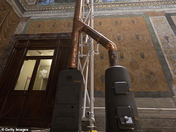 VATICAN CITY, VATICAN - MAY 02:  (EDITOR NOTE: STRICTLY EDITORIAL USE ONLY - NO MERCHANDISING). Firefighters install the chimney on the roof of the Sistine Chapel on May 02, 2025 in Vatican City, Vatican. The chimney used to communicate the choosing of a new Pope is erected on the roof of the Sistine Chapel today, ahead of Conclave beginning on the 7th May. Cardinals vote for their chosen candidate, and if there is no majority, the ballots are burnt with additives giving off black smoke. Once there is a majority, the votes are burnt without additives, giving off the white smoke signal that a new Pope is chosen. (Photo by Vatican Media via Vatican Pool/Getty Images)